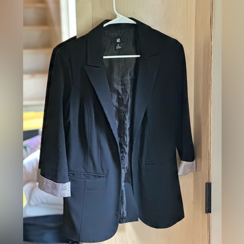 Black women’s blazer with pinstriped cuffs